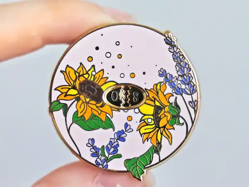 Round circle stich counters with sunflowers and blue flowers on it. 