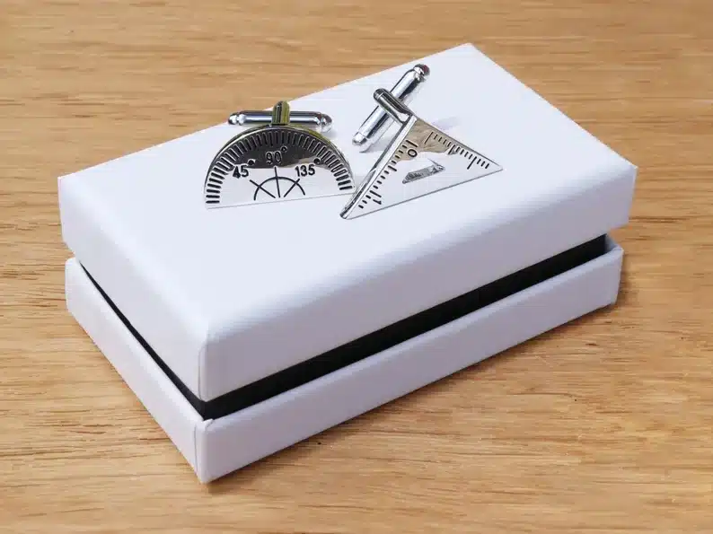 White box with math cufflinks, silver. 