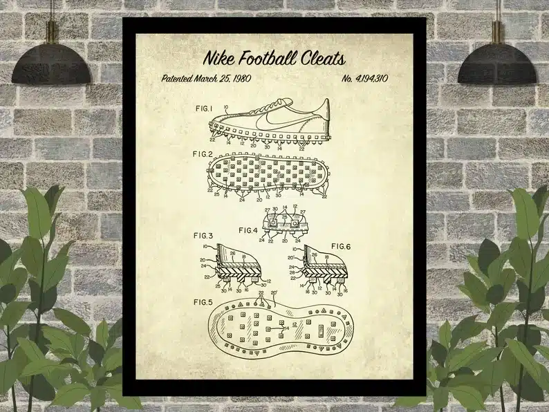 Framed artwork showing the different parts of a soccer cleat. 
