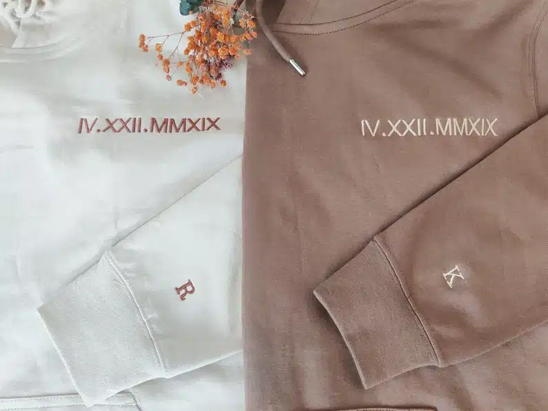 Matching wedding date minimalistic hoodies for a couple