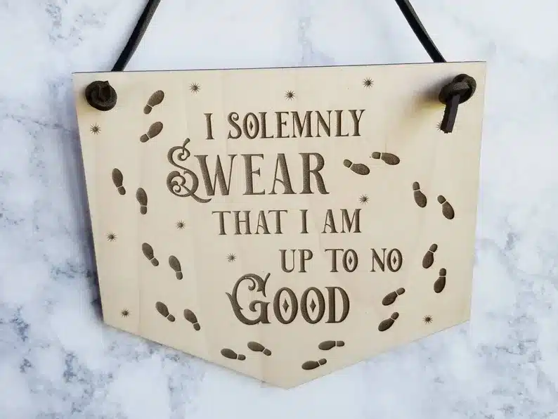 Wooden sign that says I Solemnly swear that I am up to no good. 
