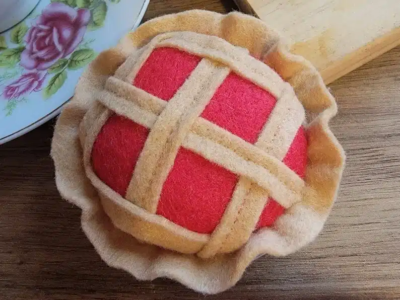 Mother’s Day Gifts for Granny: Cherry pie pin cushion made of felt. 