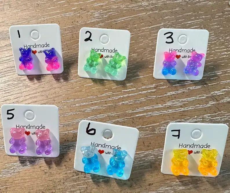 Six packages of gummy bear earrings. 