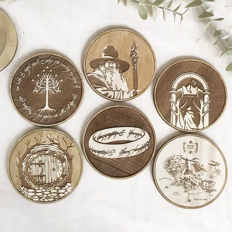 Best Gift Ideas for Devout Lord of the Rings Fans - six piece set of wooden coasters all with pictures from lord of the rings. 