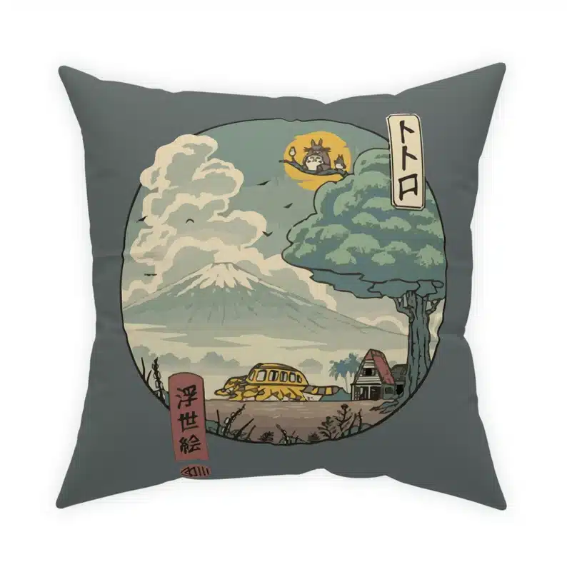 Grey square pillow with anime print on it. 