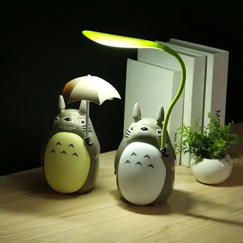 My neighbor totoro lamps, one holding a leaf to look like a lamp and the other an umbrella. 