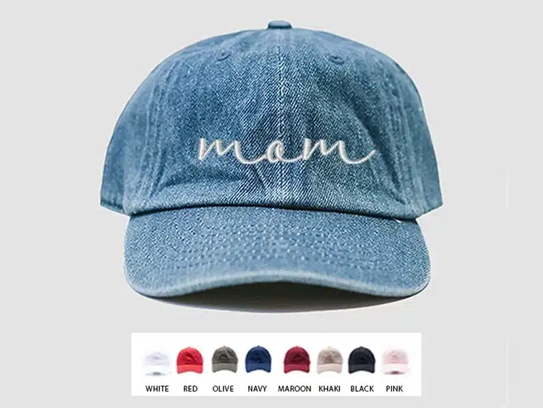 Jean baseball hat with mom in white stitched font. 