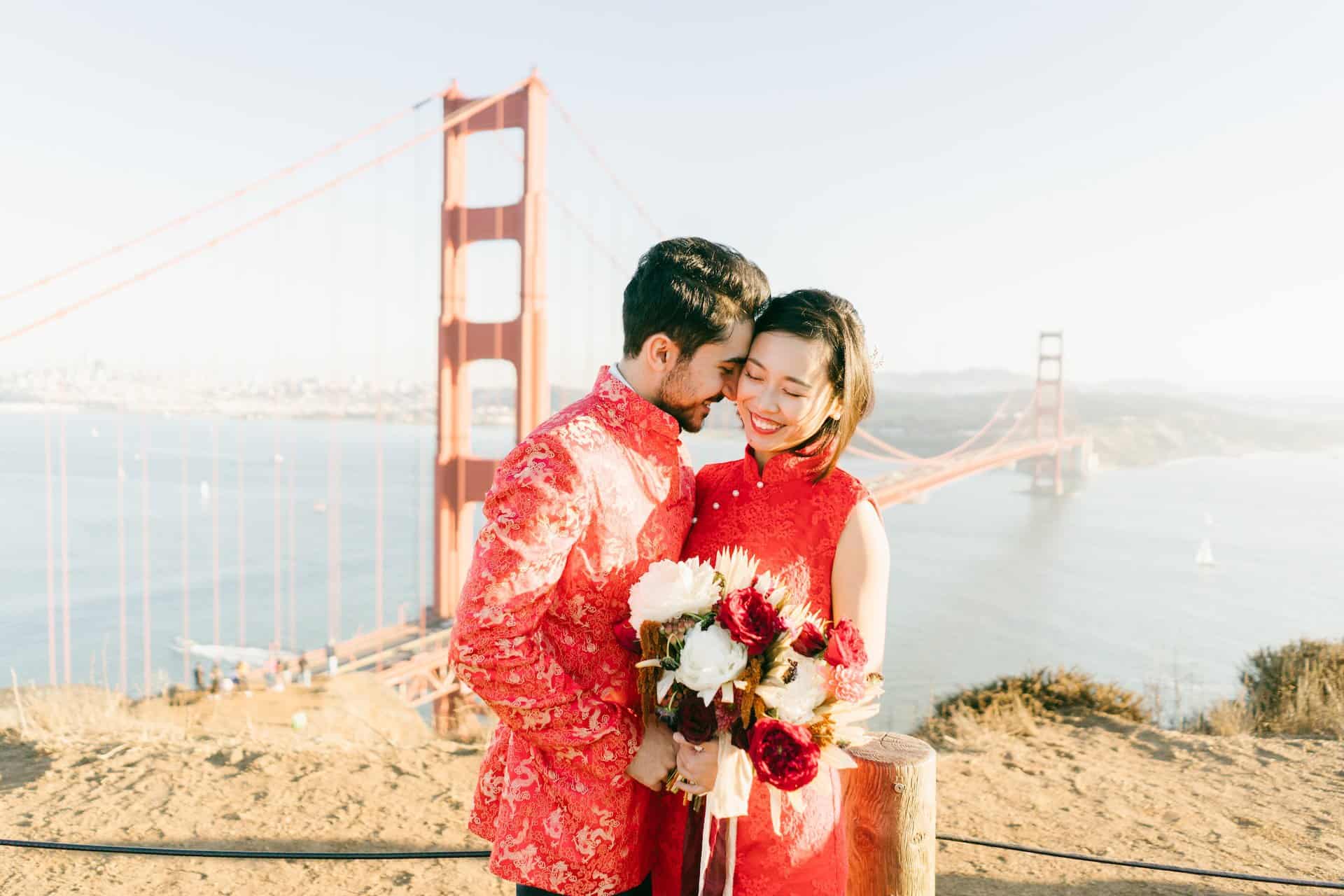 Couple wearing traditional Chinese clothing at their wedding