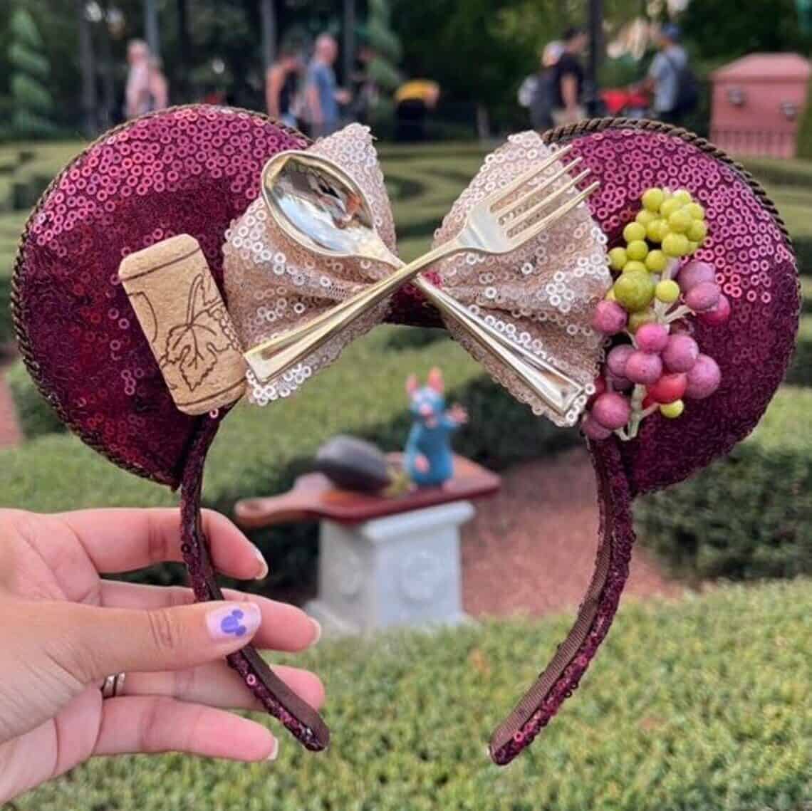 EPCOT food and wine festival l Mickey ears - purple with cork, spoon and fork, and fake grapes.