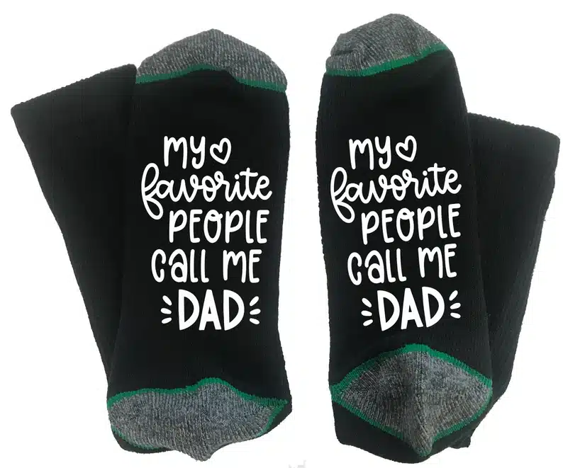Father's Day Gifts For Divorced Dads - Black socks with grey tips with white font that says My favorite people call me dad