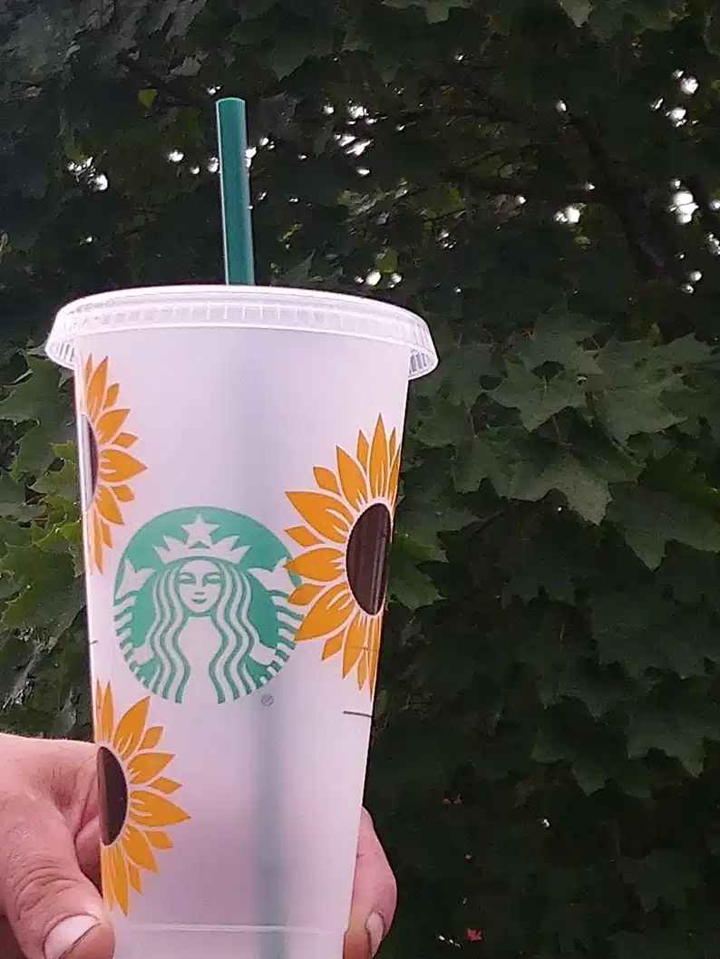 Reusable Starbucks cold cup with sunflowers on it. 
