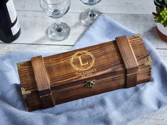 Wine presentaion box - Wooden box with an L on it. 