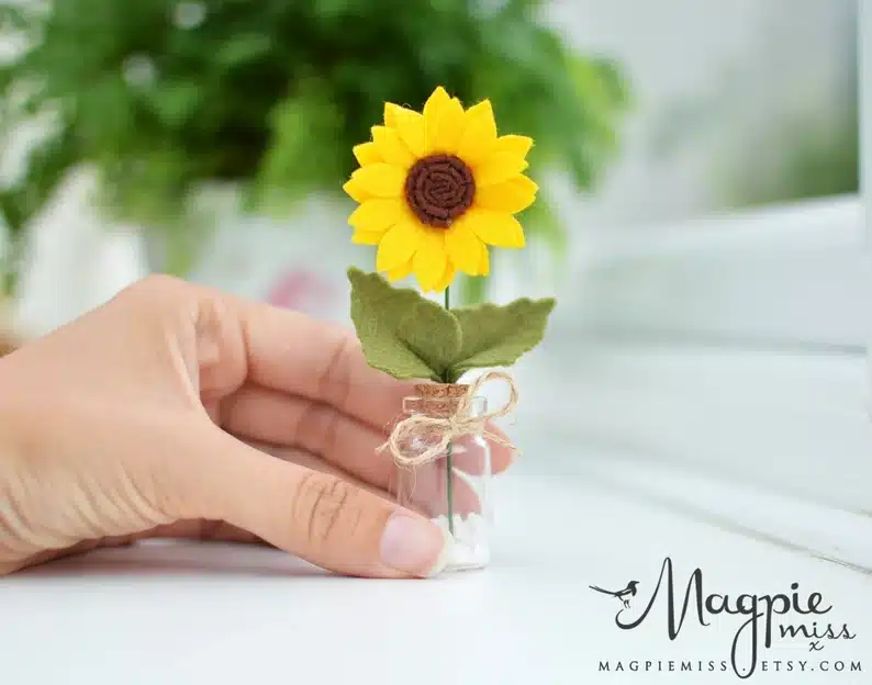 handmade mini felt sunflower in a tiny jar. 