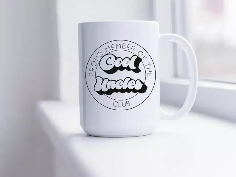 White coffee mug that says Cool uncles. 