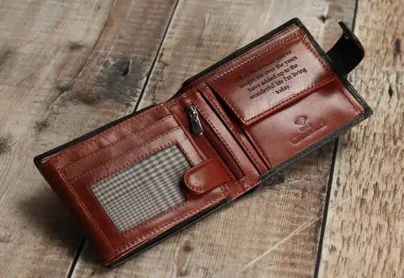 Engraved brown leather wallet. 