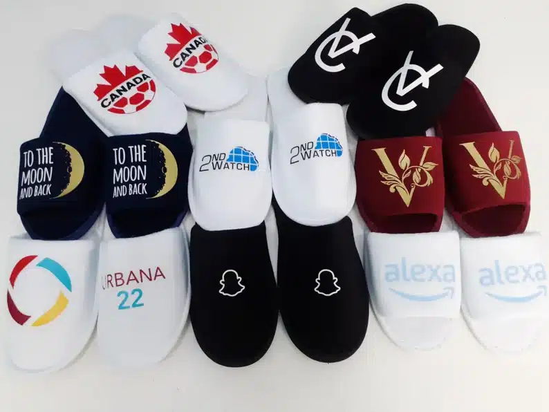 Gift Ideas For a Large Group - Eight sets of hotel style slippers, each a different color with a differnt print on them. 
