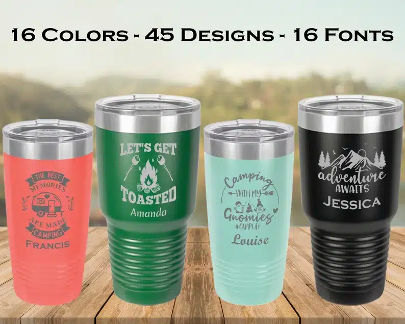 Father’s Day Gifts for Traveling Dads - Four adventures awaits travel mugs, pink, green, teal, and black shown. 