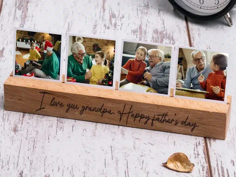 Wooden photo holder that says I love you grandpa, Happy father's day. With four snap shots of a grandfather with his grandkids. 