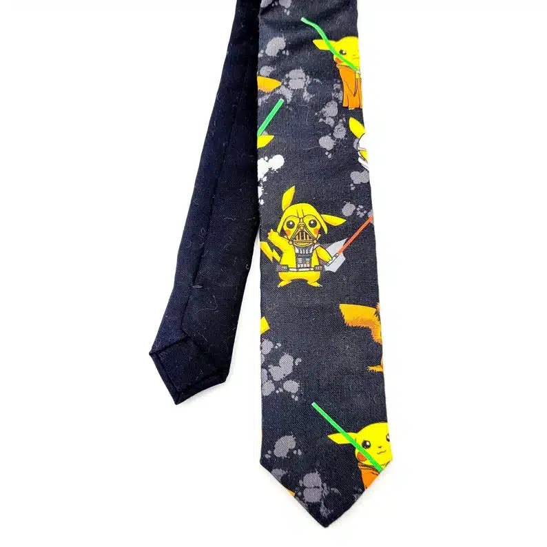 Black tie with Pikachu's with star wars accessories all over it. 