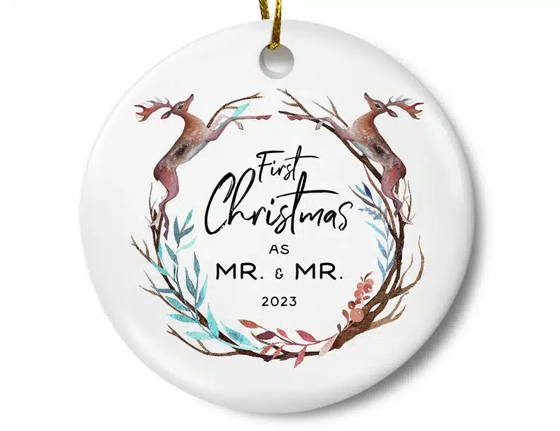 White round Christmas ornament that says First Christmas as Mr. & Mr. 2023. 
