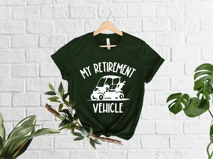 Army green t-shirt with white font that says my retirement vehicle. 
