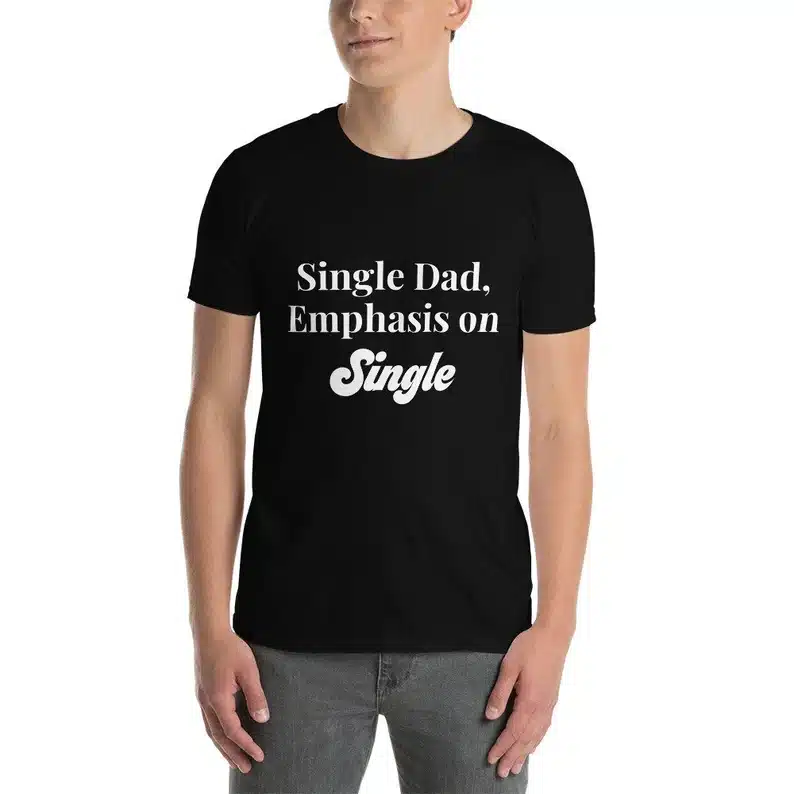 Father's Day Gifts For Divorced Dads - Man wearing a black t-shirt with white font that says "Single dad. Emphasis on single". 