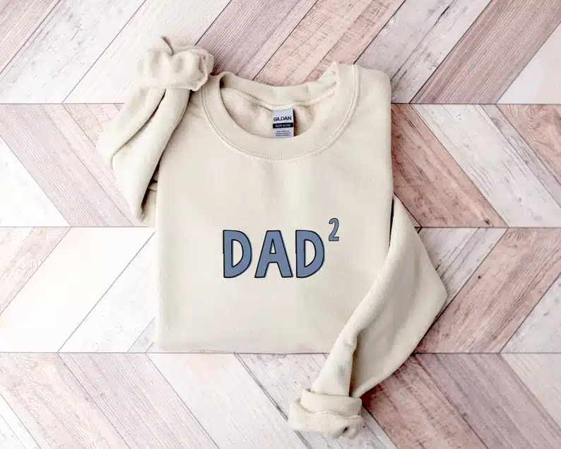 Long sleeve tan sweater shirts that says Dad