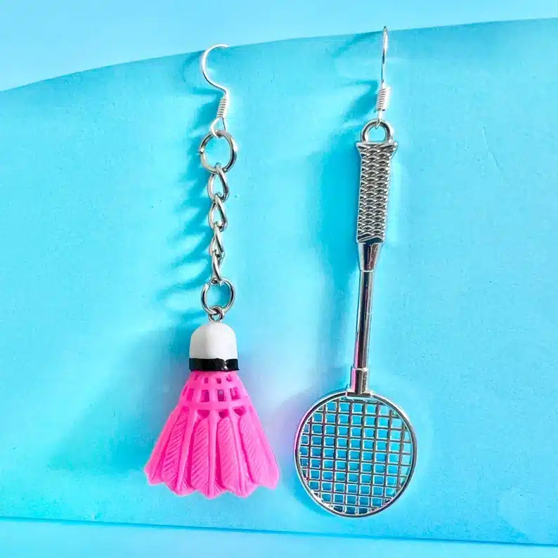 Thank You Gift Ideas for Badminton Coaches - silver earrings with a pink birdie on one and a silver racket on the other. 