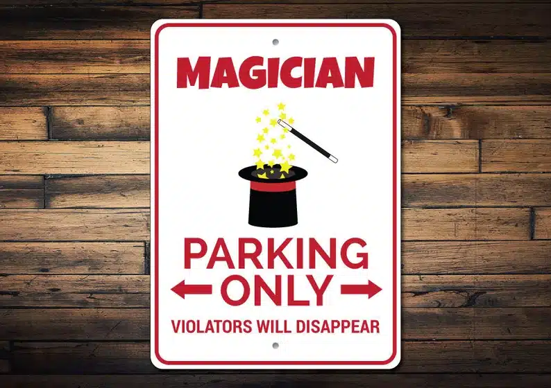 Gifts for a Magician - White parking sign with red font that says Magician Parking only Violators will disappear. 