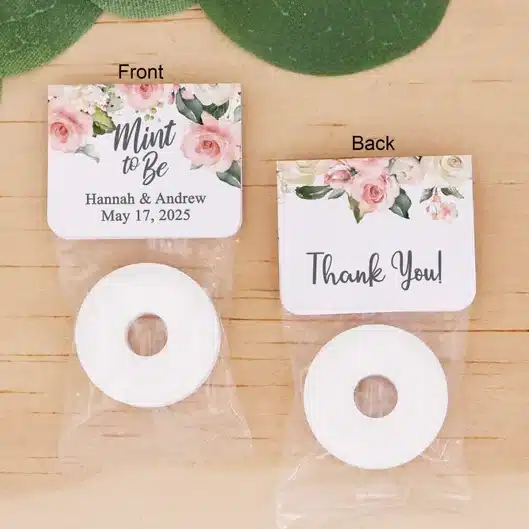 Individually wrapped white circle lifesaver mint with thank you on one and the name of the couple on the other. 