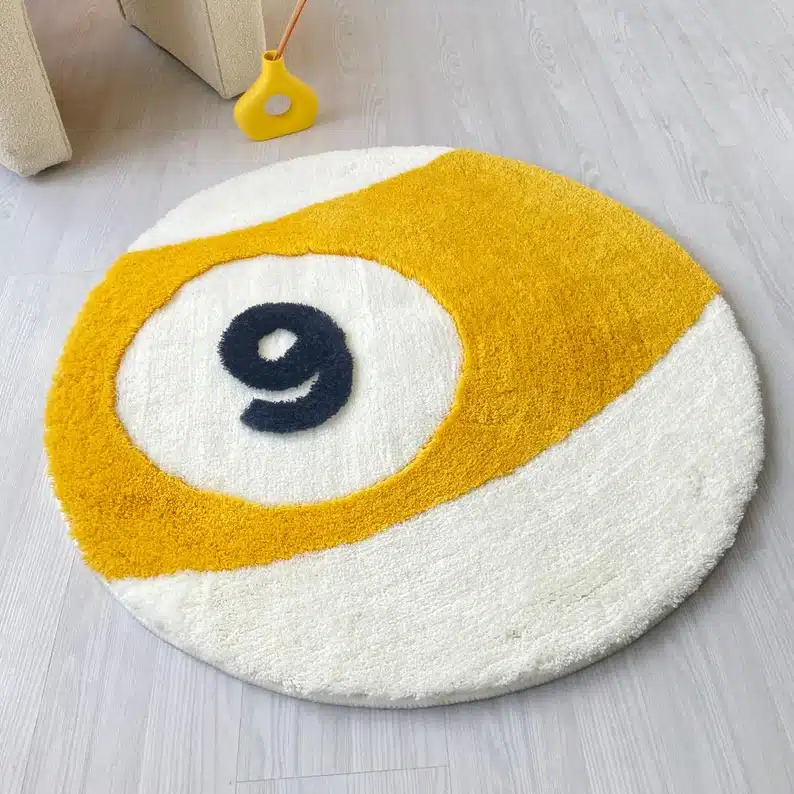  Gifts for a Pool Player - round rug shaped like a pool all that's yellow with a number 9 on it. 