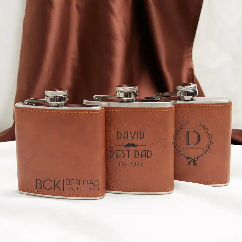 Father’s Day Gifts For Your Boyfriend - Three light brown leather custom flasks. 