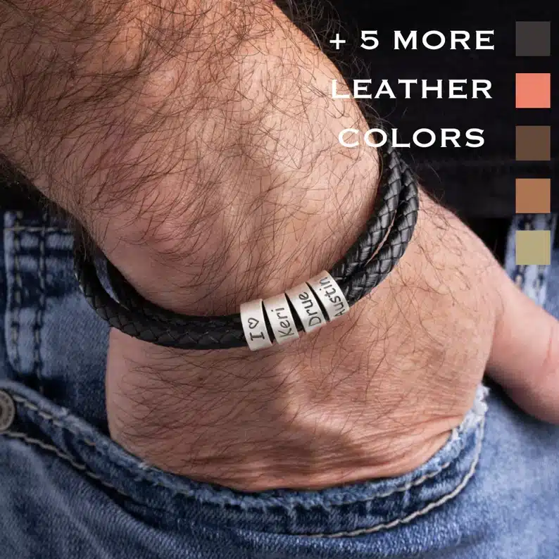 Father’s Day Gifts For Your Boyfriend - Dark brown leather bracelet with four silver charms with names on it. 