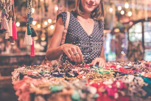 Women shopping for something in a market