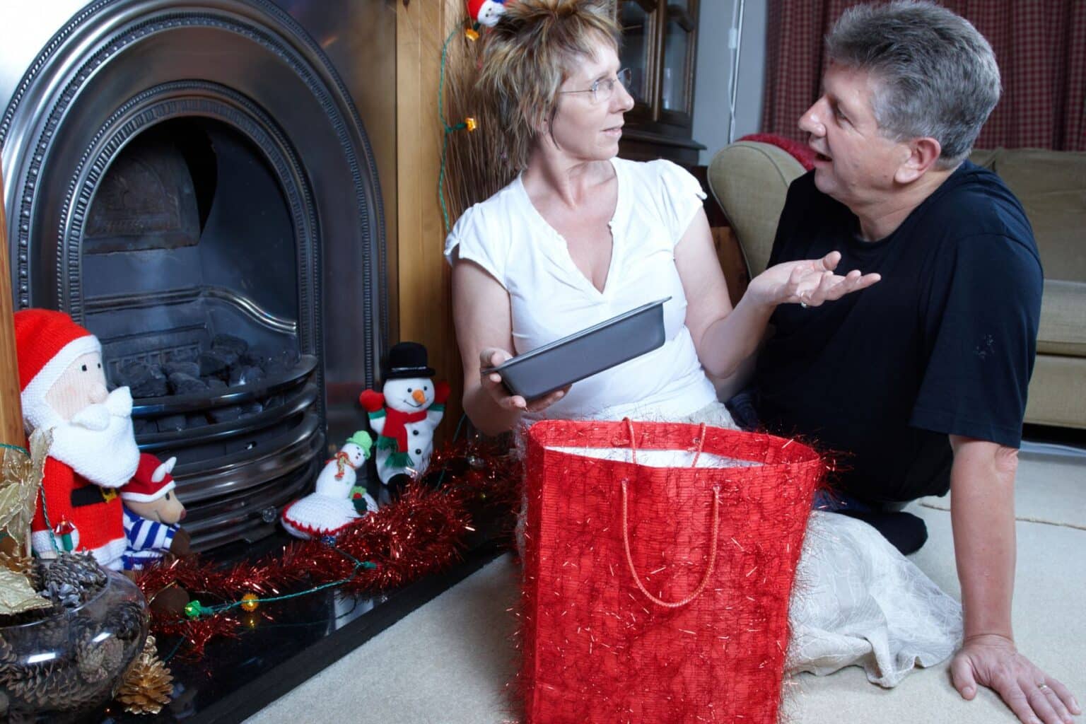woman unhappy with the gift her husband gave her