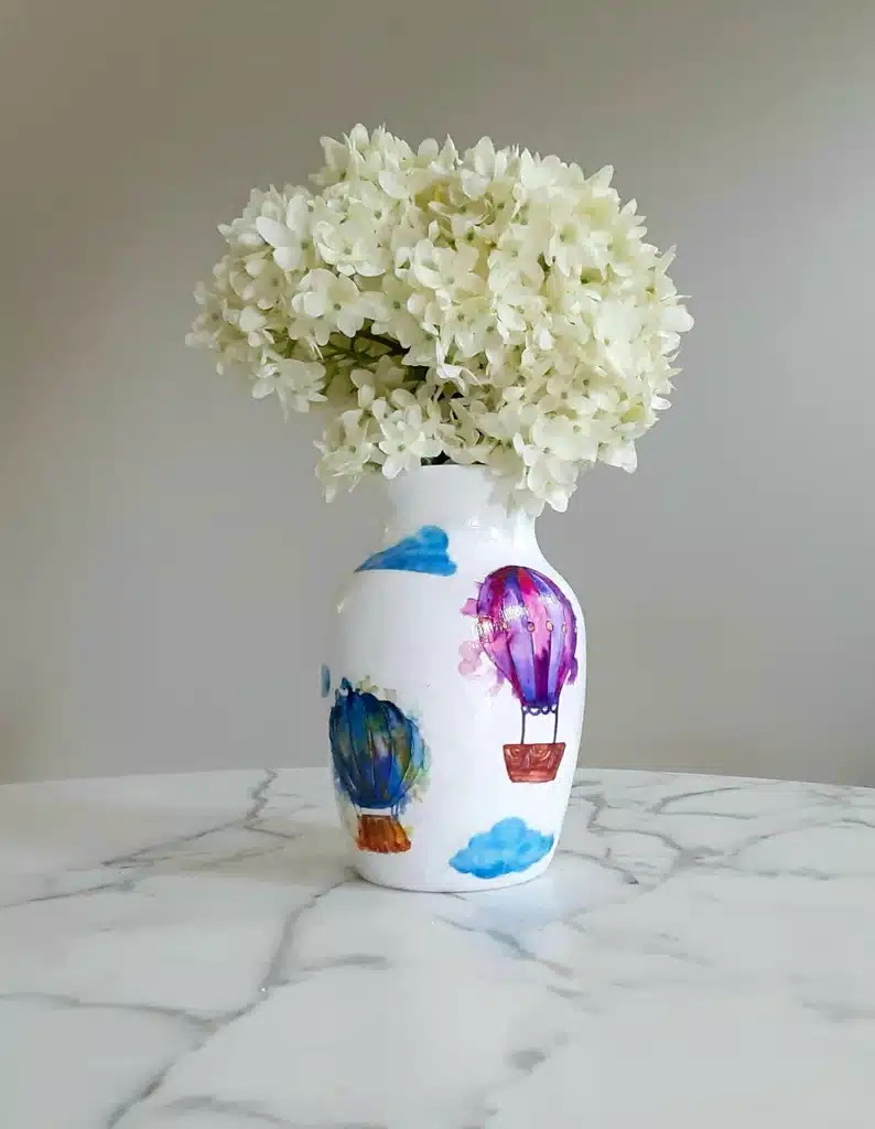 Gifts For People Who Love Hot Air Balloons - white vase with water colored hot air balloons on it. 