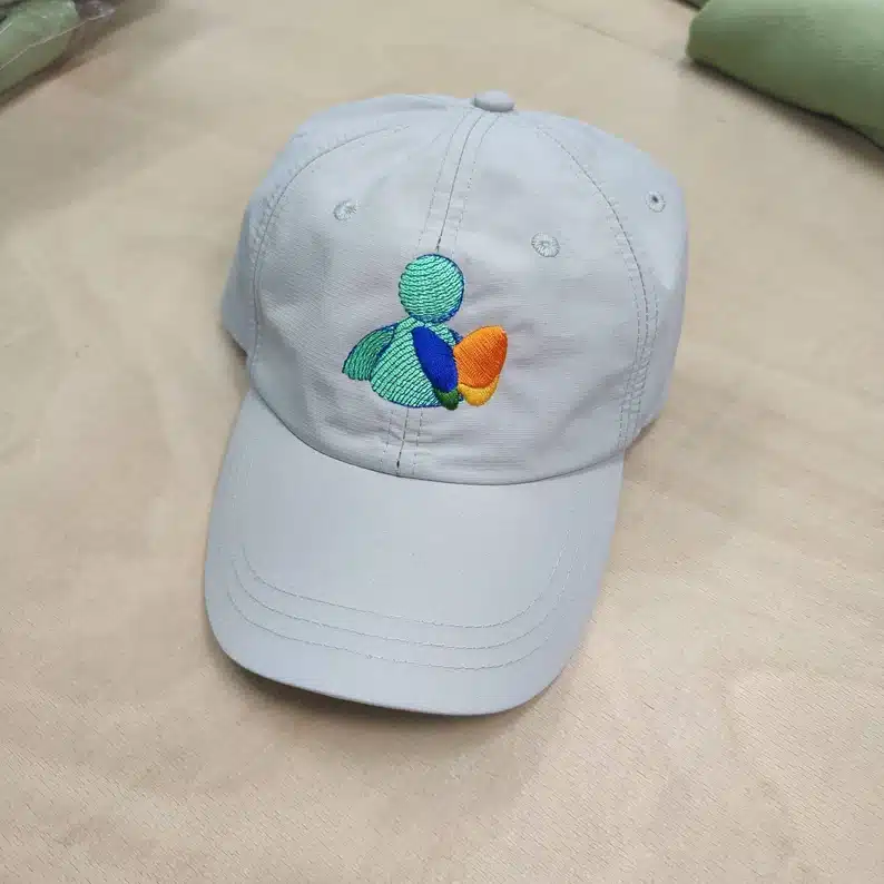 Gift Ideas To Celebrate The 00s (Decade) - MSN messenger log in symbol on a white baseball hat. 