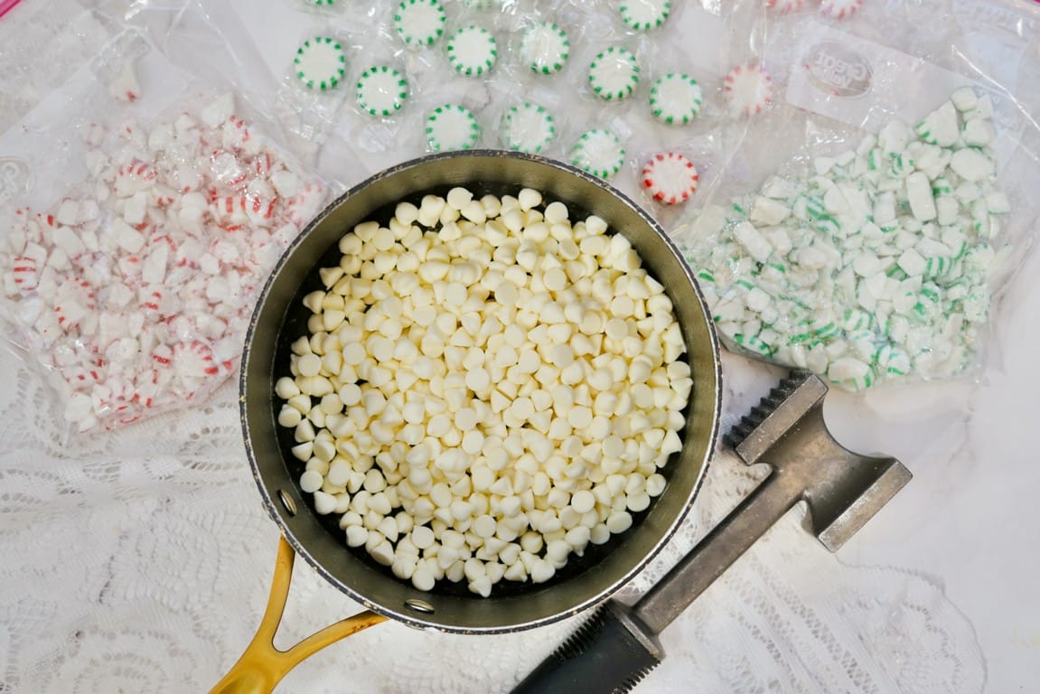Christmas White Chocolate Peppermint Pretzel Rods - Above view of a pan with white baking chips in them about to be melted.