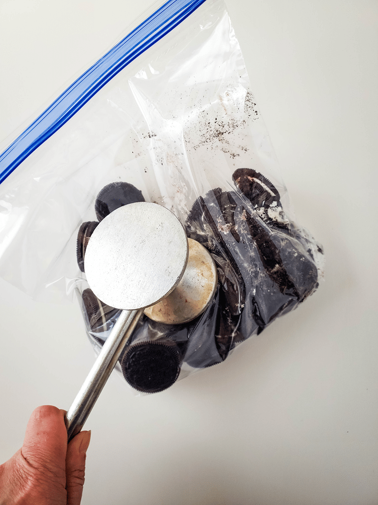 ziplocl bag with oreos about to be crushed.