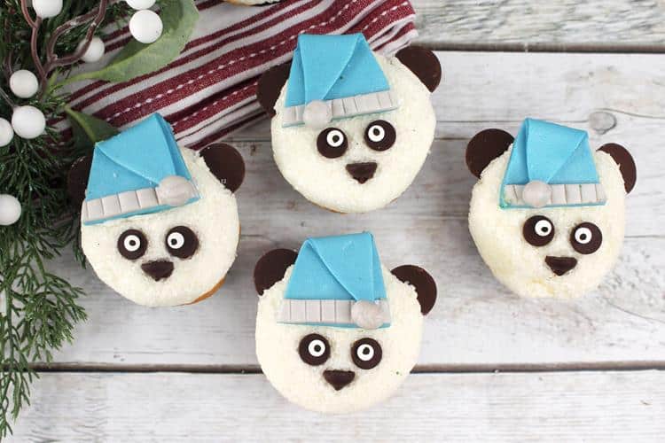 Adorable Sleepy Panda Cupcakes - four completed panda cupcakes.