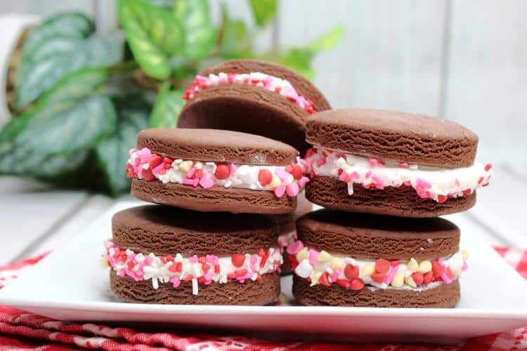 white plate of chocolate valentine cookies.