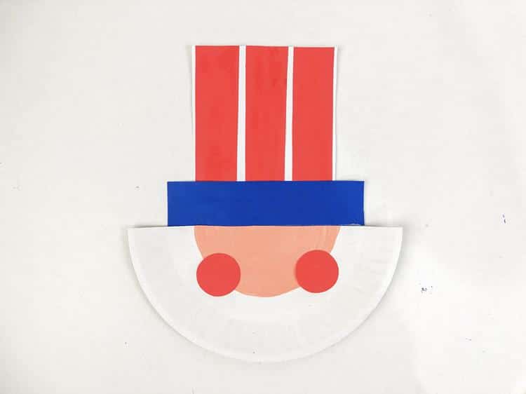 Red circles added to plate as cheeks. Uncle Sam Paper Plate Craft