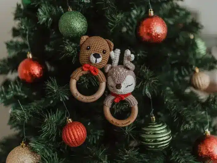 Christmas Gift Ideas for Infants - christmas tree with two handmade rattles on it, one a bear and one a reindeer. 