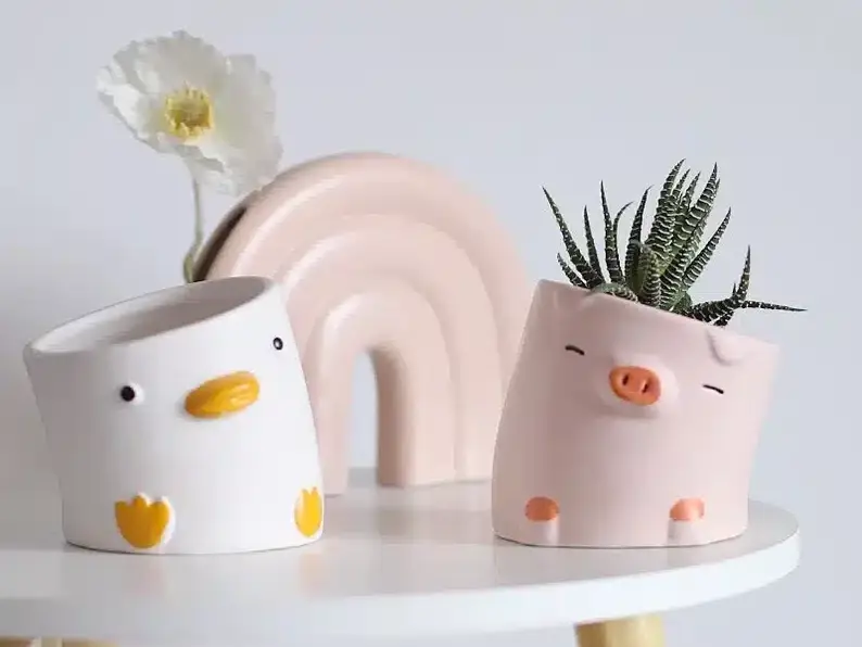 Cute mini pig and duck planters for succulents