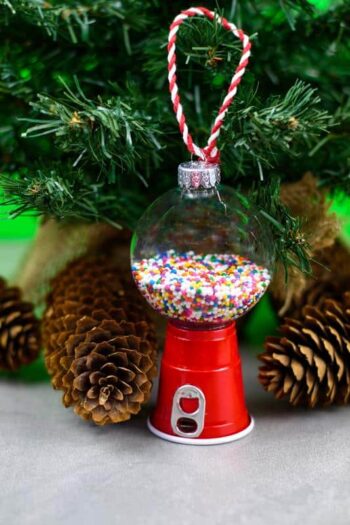 Retro Gumball Machine DIY Christmas Ornament hanging on a tree