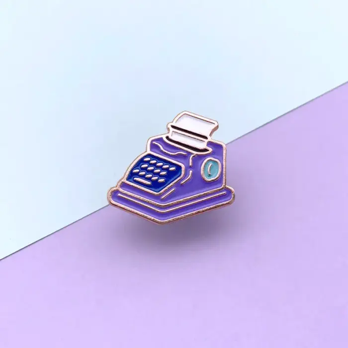 Vintage Typewriter Enamel Pin: A Perfect Accessory for Writers and Literature Lovers
