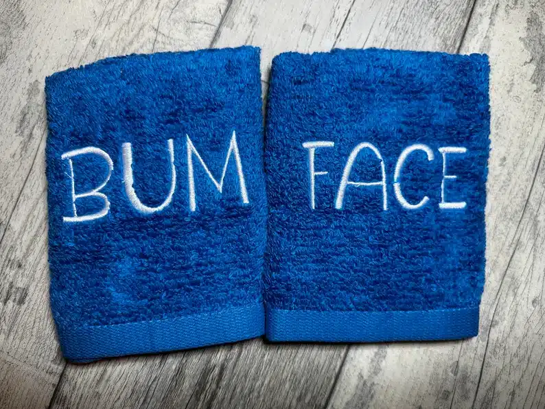 Bum and Face labelled washcloths