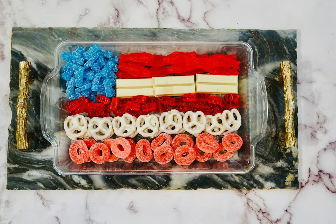 Glass pan filled with candy made to look like the American flag 