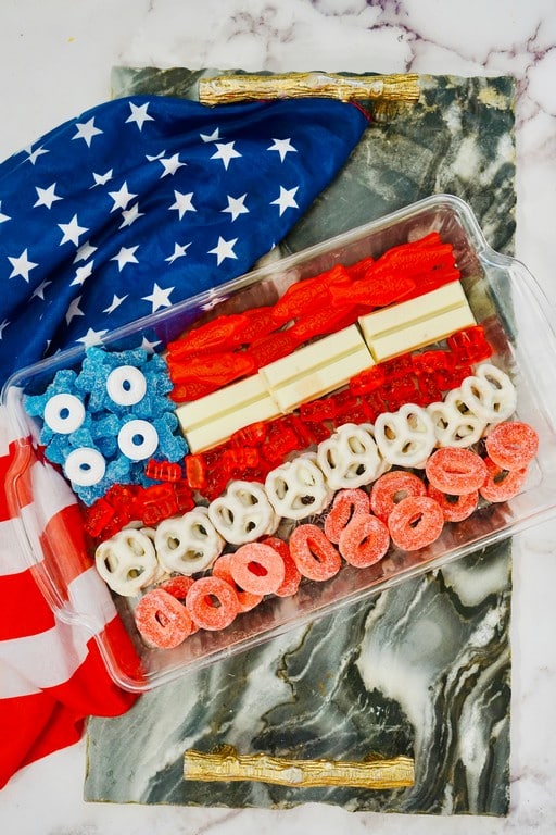 Glass pan with blue, red, and white candies in it to make a Flag. 
